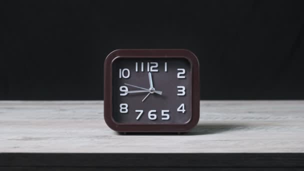 Pointer Clock Wooden Table Black Background Show Time Oclock Second — Stock Video