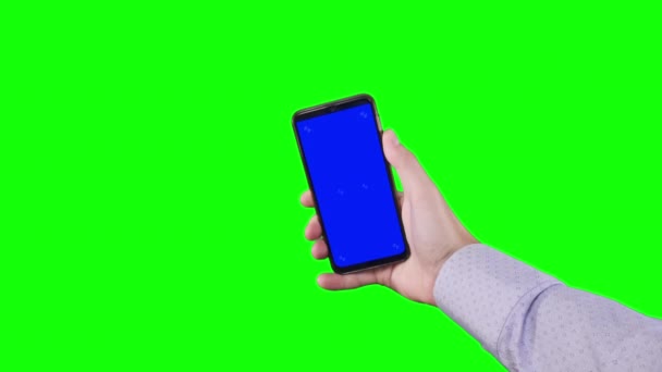 Male Hand Holding Smartphone Blue Screen Trackers Green Background Chroma — Vídeo de Stock