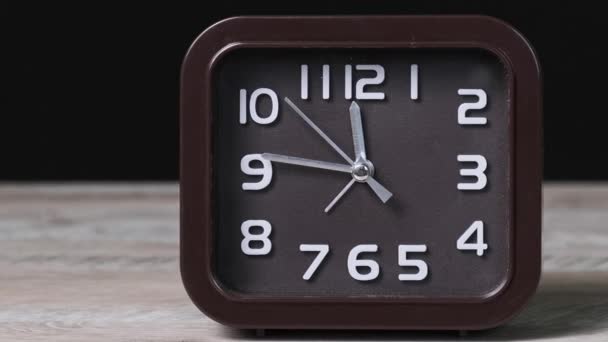 Pointer Clock Wooden Table Black Background Show Time Oclock Second — Stock Video