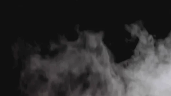 Smoke with Alpha channel. Realistic smoke or vapor clouds rise up on a transparent background. Special effect, texture, footage, use in composite and video editing. Smoke atmosphere fog overlay. 4K