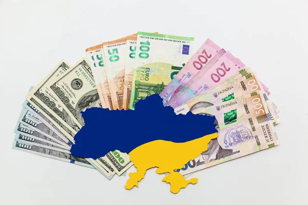 Map Ukraine Painted Blue Yellow Lies Banknotes Dollars Euros Hryvnias — Zdjęcie stockowe