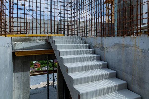 Rebar metal frame. Steel mesh interconnected at the construction site. Construction of multi-storey frame houses