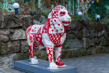 Ukraine, Lviv December 21, 2019: Lion statue painted with art paints
