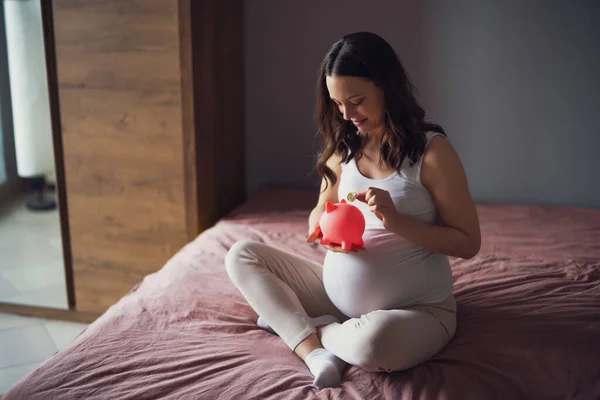 Happy Pregnant Woman Relaxing Home She Sitting Bed Saving Coin — Stock Photo, Image