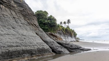 Beaches and cliffs in the Colombian Pacific Ocean. Tourism and relaxation in Valle del Cauca, Colombia. clipart