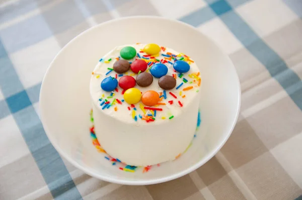 Ice-cream with decor on the white plate