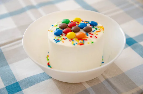 Ice-cream with decor on the white plate