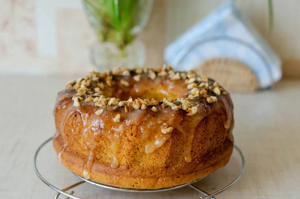 Round cupcake with lemon torring and nuts