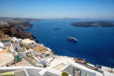 Beautiful white architecture of Santorini island, summer landscape with blue sky, sea and caldera view, outdoor travel background, Imerovigli, Greece