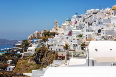 Beautiful white architecture of Santorini island, summer landscape with blue sky, sea and caldera view, outdoor travel background, Imerovigli, Greece