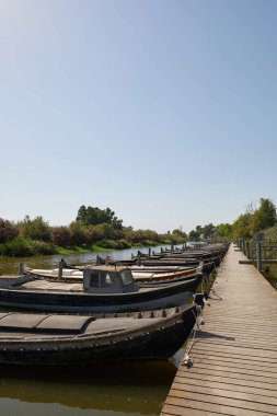 Catarroja traditional fishing boats port (pier) in the Valencia Albufera natural park, vertical format