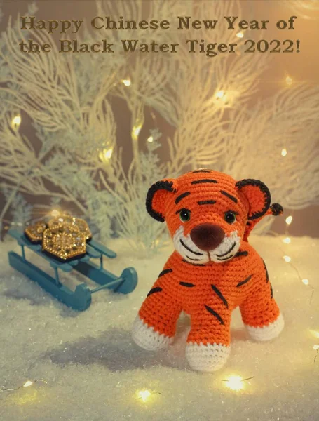 Knitted Woolen Tiger Cub Sits Next Toy Light Blue Trees — Stock Photo, Image