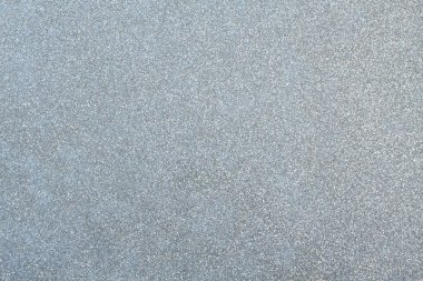 Gri gümüş parıltı yüzeyi. Doku. Yukarıdan bak. Yakın çekim..