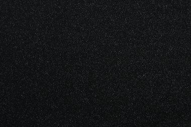 Siyah parıltı yüzeyi. Doku. Yukarıdan bak. Yakın çekim.