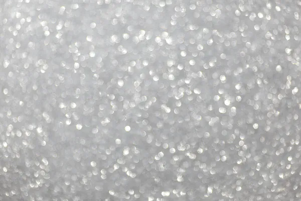 Defocused christmas or party, grey glitter background with bokeh. Holiday glowing backdrop,banner or card — Stock Photo, Image