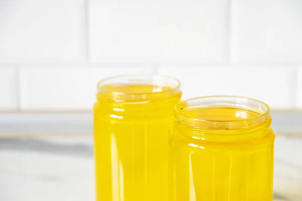 Two jars of clarified ghee butter — Stock Photo, Image