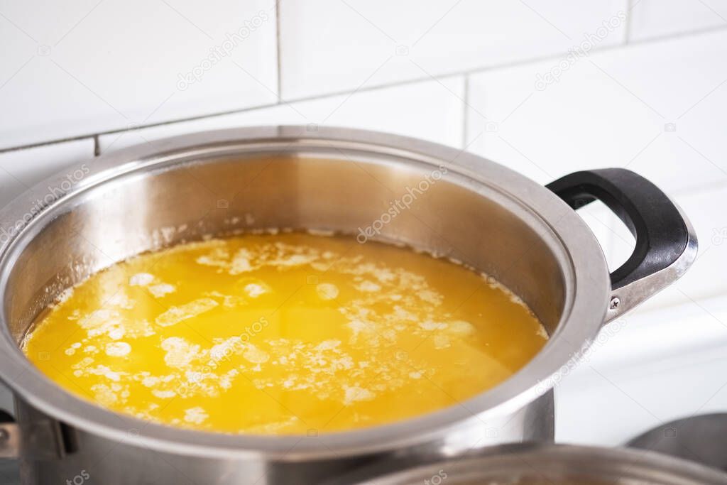 Melt the butter in a stainless saucepan. Cooking ghee