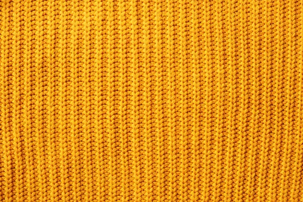 Orange warm sweater knitted striped minimalistic background — Stockfoto