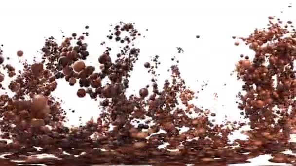 Szénsavas tejcsokoládé buborék tört habzó golyók kakaó gömbök robbanás alfa — Stock videók