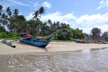 Sri Lanka, Hint Okyanusu kıyısında bir tekne.