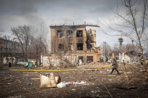 Dnipro, Ukraine Mar 11, 2022: road, neighborhood, factory, rocket, houses, car, bomb, shooting, metro, people, — Stock Photo, Image