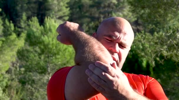 Slow Motion Man Complains Elbow Pain — Stockvideo