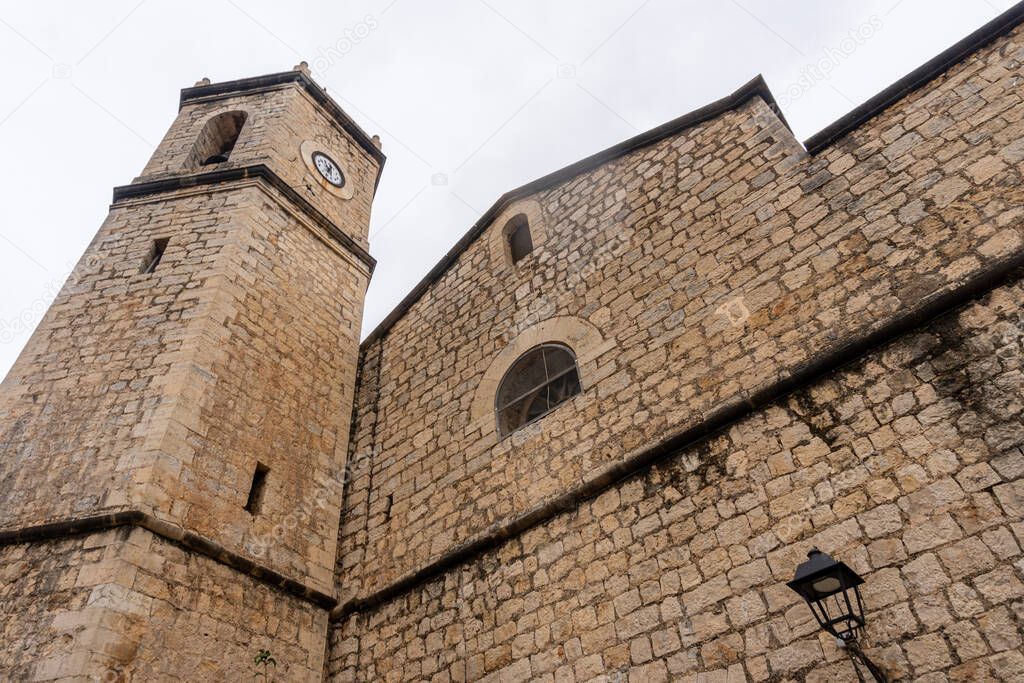 Exterior of the church and belfry of Llber, (Alicante, Spain).