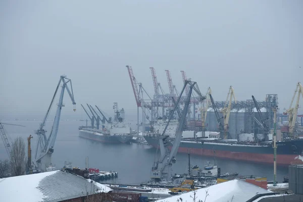 Logistics and transportation of Container Cargo ship and Cargo plane with working crane bridge in shipyard at sunrise, logistic import export and transport — Stock Photo, Image