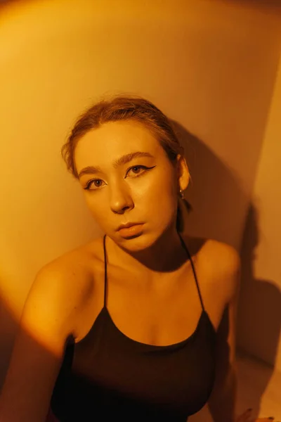 Portrait of a young woman with spot light — Stock Photo, Image