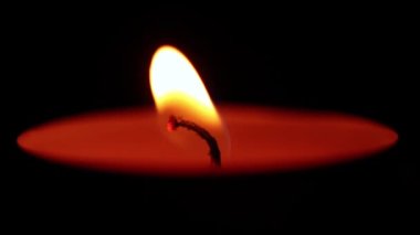 Candle lit in the room at night