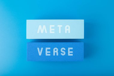 Metaverse modern minimal concept in blue colors. Written metaverse single word on blue rectangles against blue background. Future technologies.  clipart