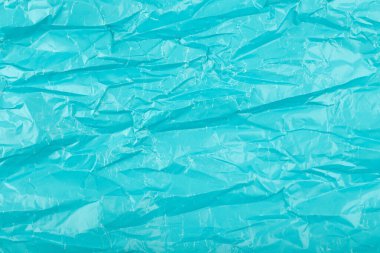 Mavi buruşmuş kağıt dokusu arkaplan ve metin için boşluk. Buruşuk ambalaj kağıdı arka planı. Yüksek çözünürlüklü metin şablonu kavramı