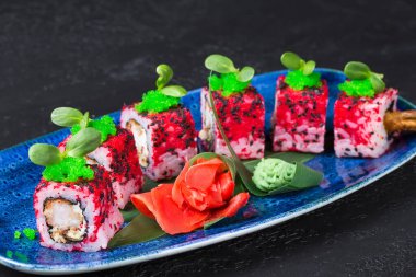 Fresh sushi dish on a blue plate