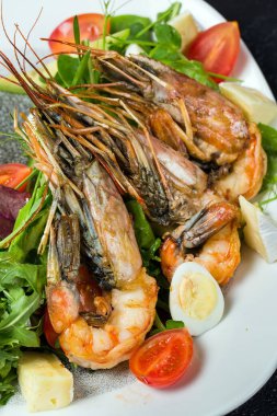 Langoustines dish on a plate in a cafe, seafood delicacies