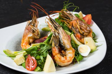Langoustines dish on a plate in a cafe, seafood delicacies