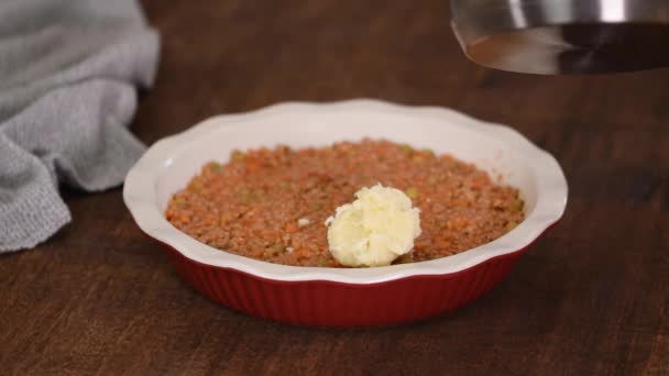 Woman Making Shepherd Pie Mashed Potatoes Being Placed Top Minced — Stock Video