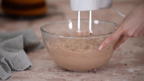 Professional Confectioner Whipping Chocolate Cream Using Handheld Electric Mixer — Stock video