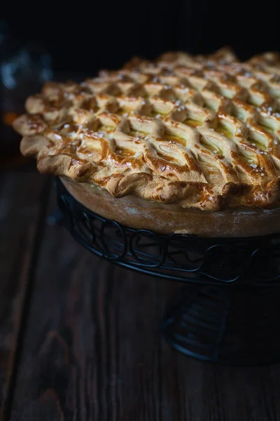 English meat pie. Pork pie. Traditional British pie. Freshly baked homemade savory pies with golden crust. Pie with pastry decoration on top. Food photography, food styling. English cuisine.