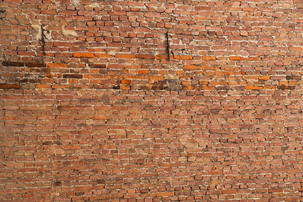 Wall with red bricks. Old brick wall background. grunge brick background texture