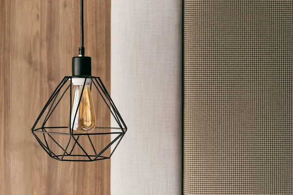 Modern interior lamp with vintage light bulb. Minimal style. Fashion decor and design concept