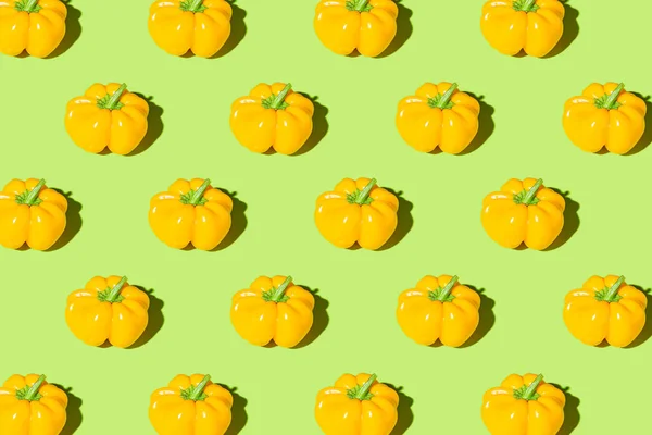 Creative Pattern Made Yellow Bell Pepper Green Pastel Background Shadows — 스톡 사진