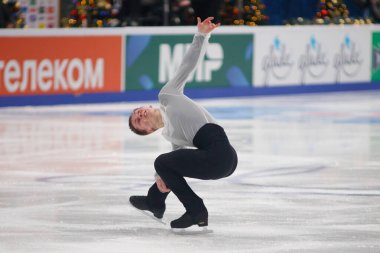 Saint Petersburg, Rusya - 24 Aralık 2021: Rus milli takımı 2022 Artistik Patinaj. Erkekler Serbest Patinaj. Mikhail Kolyada