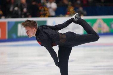 Saint Petersburg, Rusya - 24 Aralık 2021: Rus milli takımı 2022 Artistik Patinaj. Erkekler Serbest Patinaj. Evgeni Semenko