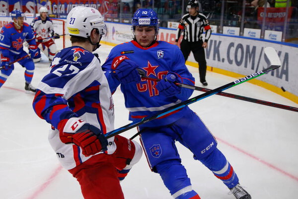 Zakhar Bardakov (10) of SKA Saint Petersburg and Maxim Sorokin (27) of CSKA Moscow seen in action during the 2021-22 KHL Regular season of the Kontinental Hockey League between SKA Saint Petersburg and CSKA Moscow at the Ice Sports Palace