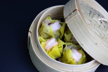 Dim Sum , Traditional Chinese Brunch, Steamed Dumpling , grounded Pork and Shrimp wrapped with flour