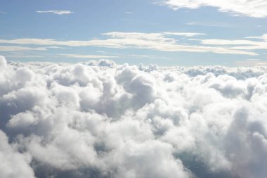 Fluffy Clouds in Summer , view from airplane