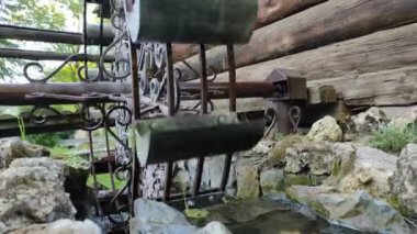 Footage of vintage watermill building - constration