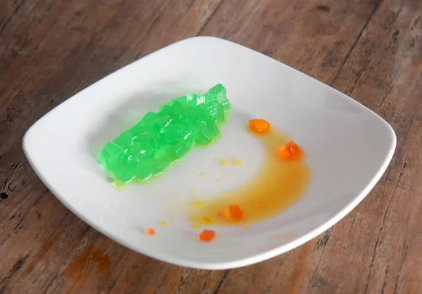 Colorful Jelly Drink Placed White Plate Brown Wooden Table — Stock Photo, Image