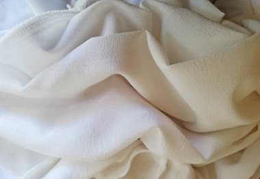 Beyaz kumaş arkaplanı yakın plan