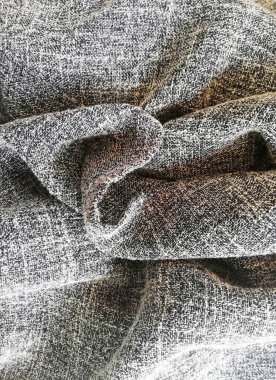Gri kumaş tekstil arkaplanı yakın plan